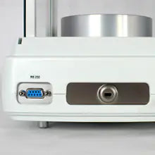 Zoomed view of power interface and cable management of Kern precision balance