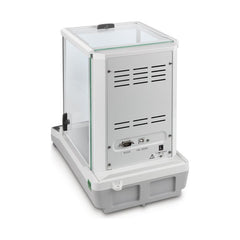 Scale in use with sample container placed on pan of Kern high-accuracy weighing device