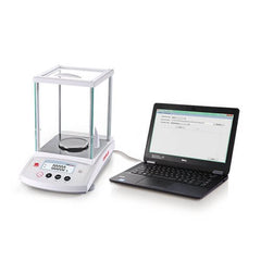 Ohaus PR precision laboratory balance connected to a laptop via USB interface