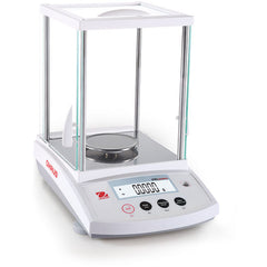 Side view of Ohaus PR precision laboratory balance with glass draught shield