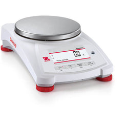 Side view of Ohaus Pioneer PX precision laboratory balance with round weighing platform